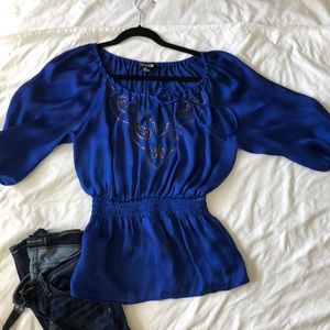 Sinched waist silk top with beading